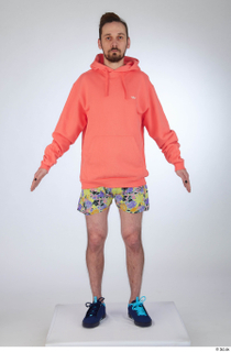 Nigel a-pose blue sneakers dressed floral printed shorts salmon hoodie…